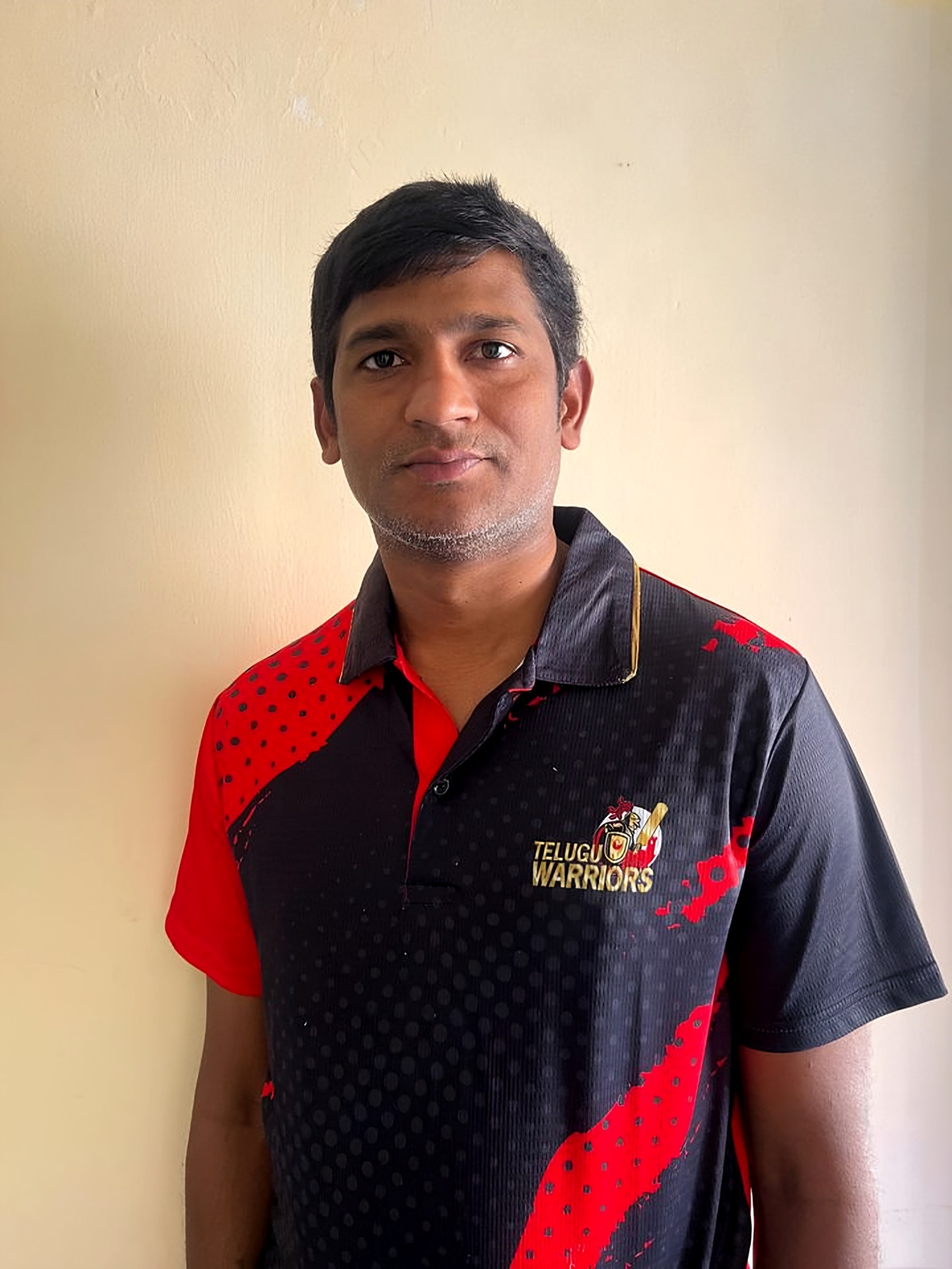 In a Telugu Warriors jersey